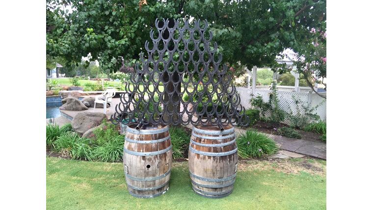 Black Metal Horse Shoe Wine Rack | Rental Black Metal Horse Shoe Wine Rack | Rental